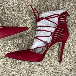 Cranberry red pumps. Sexy! Worn once, in excellent condition!
